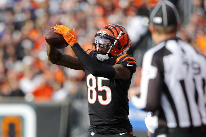 Dec 26, 2021; Cincinnati, Ohio, USA; Cincinnati Bengals wide receiver Tee Higgins (85) makes a catch against the Baltimore Ravens during the first quarter at Paul Brown Stadium. Mandatory Credit: Joseph Maiorana-USA TODAY Sports